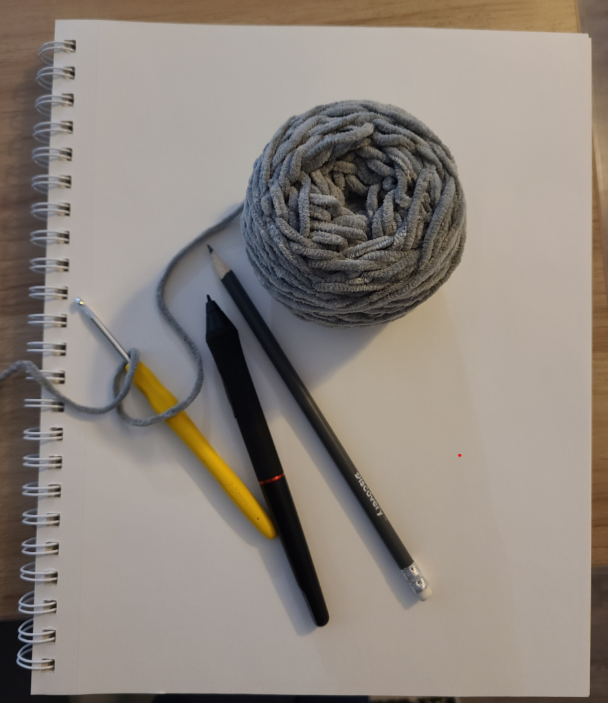 sketchbook and yarn